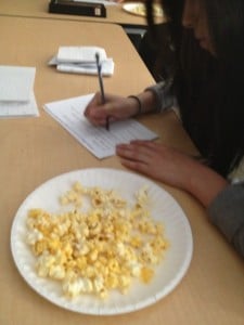 Saying nice things about their classmate's video (while enjoying some popcorn).  :)